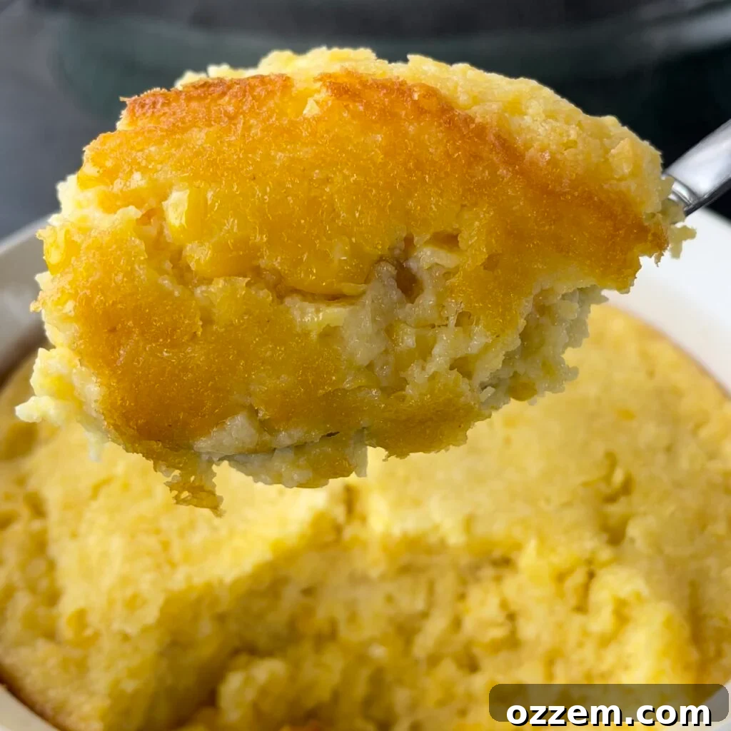Golden Creamy Corn Bake 2 A golden-baked cream corn casserole, fresh out of the oven, ready to be served as a delicious side dish.