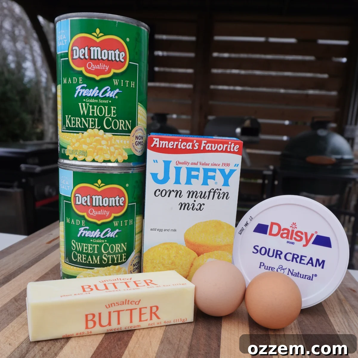 Golden Creamy Corn Bake 3 A flat lay photograph showcasing all the simple ingredients required to make a delicious cream corn casserole.