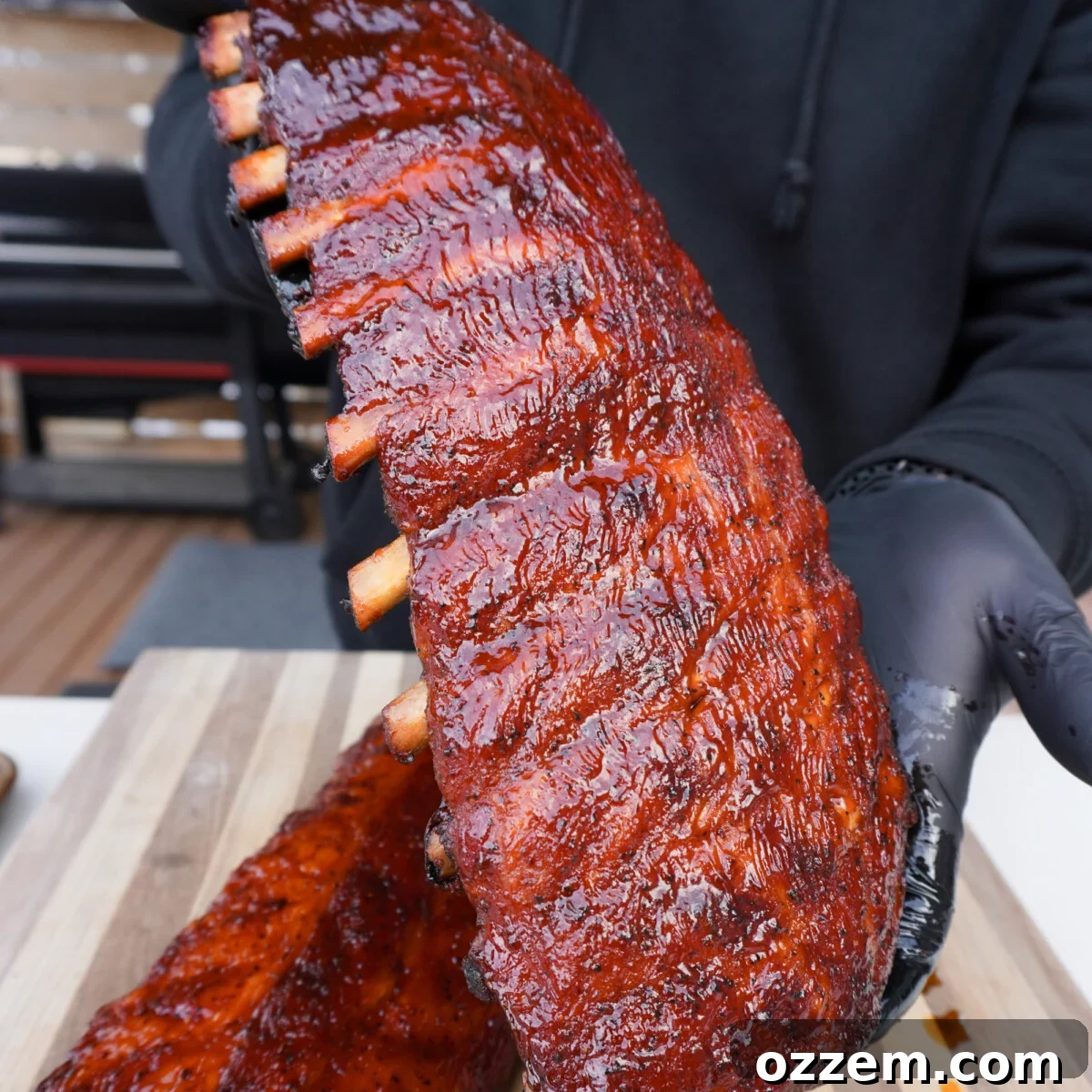 Succulent Slow-Smoked Baby Back Ribs 2 Classic BBQ baby back ribs, perfectly smoked and glazed.