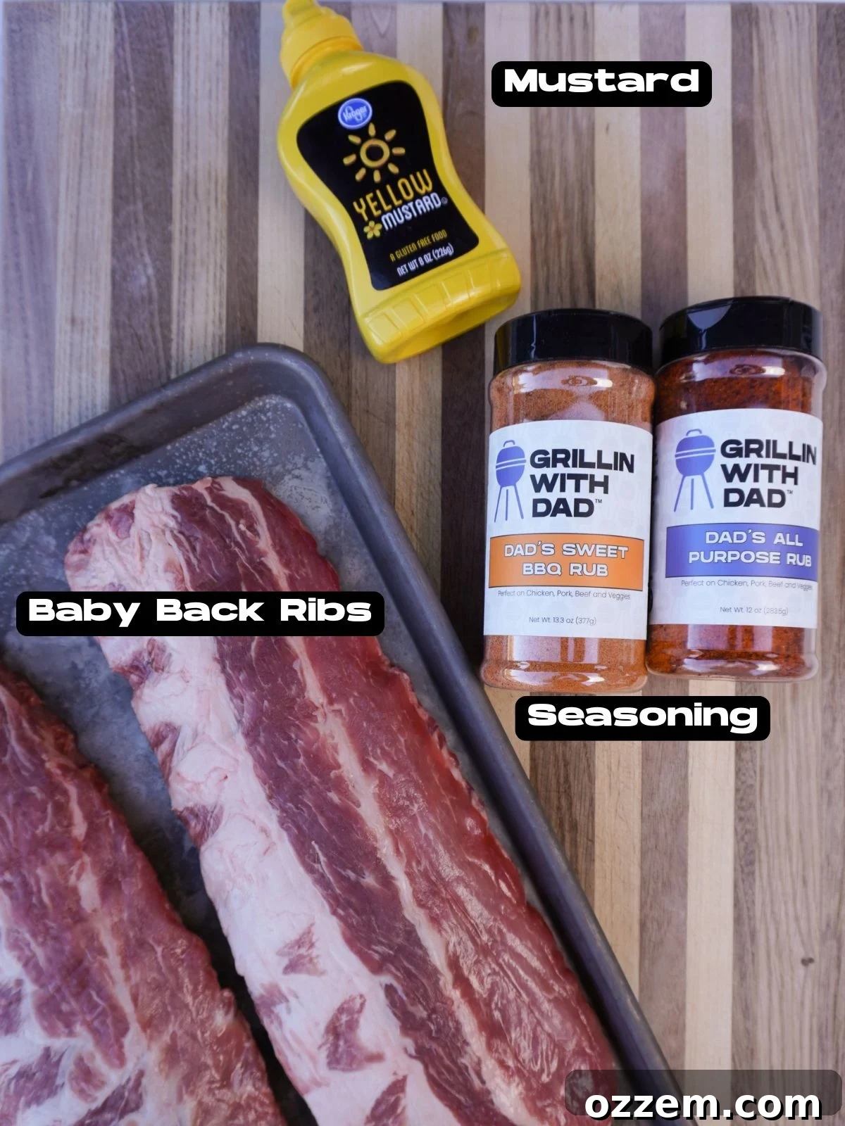 Succulent Slow-Smoked Baby Back Ribs 4 Ingredients laid out for classic BBQ baby back ribs, including ribs, mustard, seasonings, and BBQ sauce.