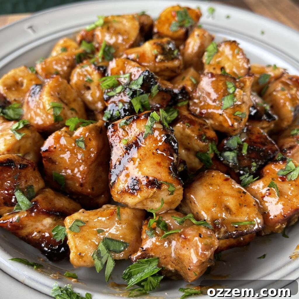 Grilled Cajun Honey Pork Bites, glistening with sauce