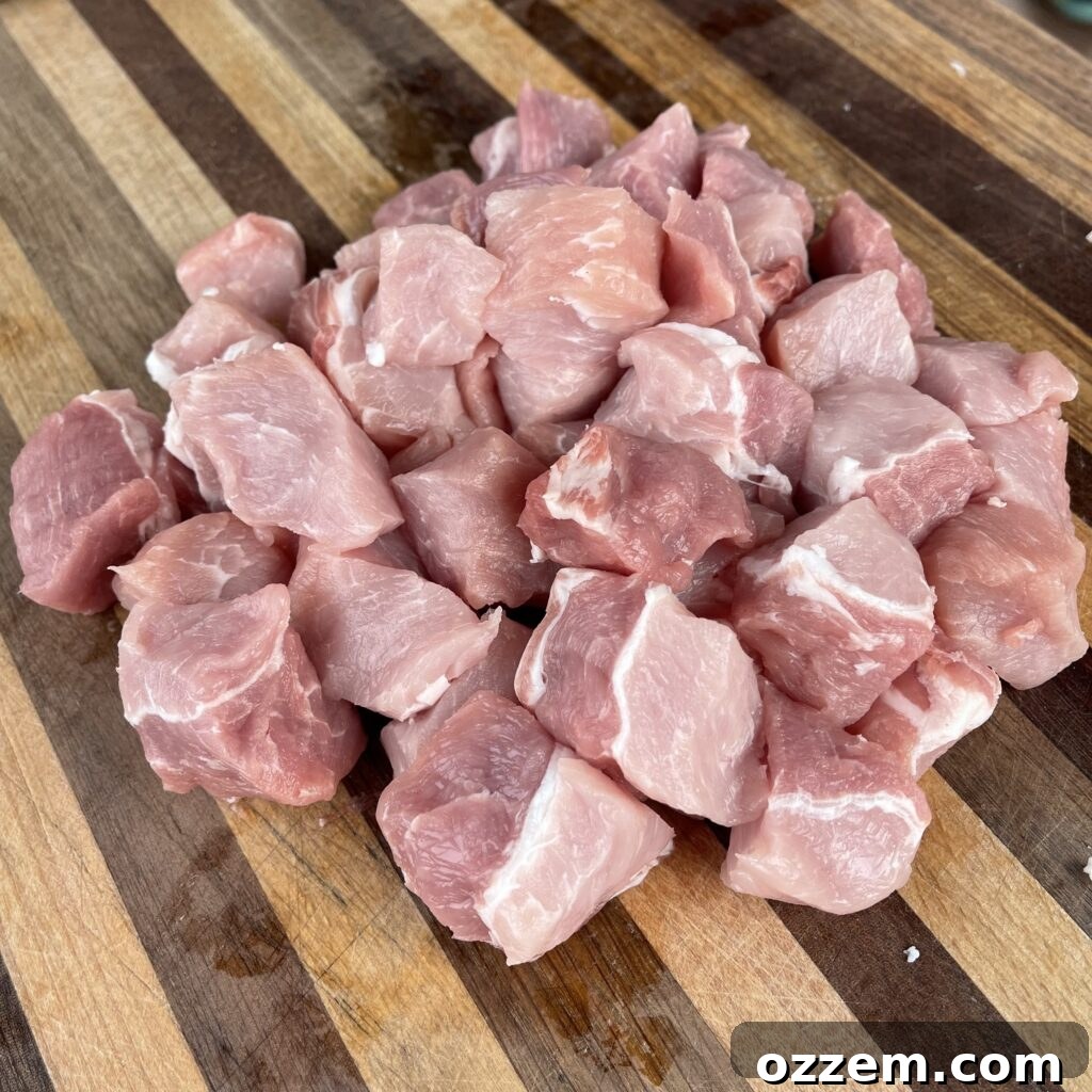 Cubed and seasoned pork loin on skewers