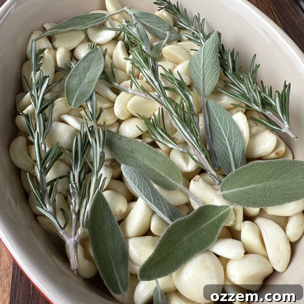 Close-up of peeled garlic cloves ready for confit.