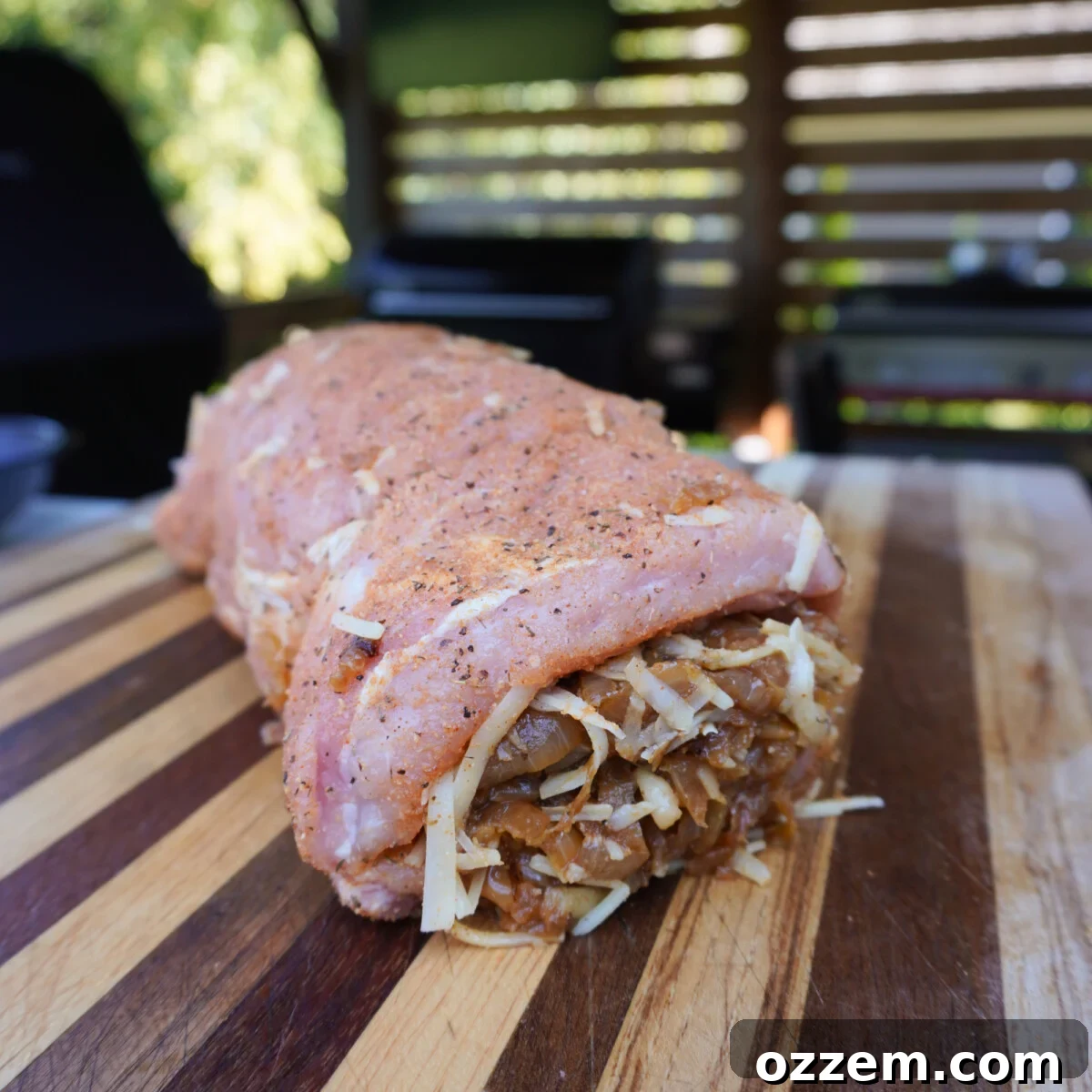 Caramelized French Onion Pork Loin 10 Rolled and stuffed raw french onion pork loin, tied with butcher's twine.