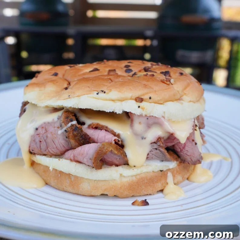 Smoked Beef and Cheddar sandwich on a plate, ready to be enjoyed.