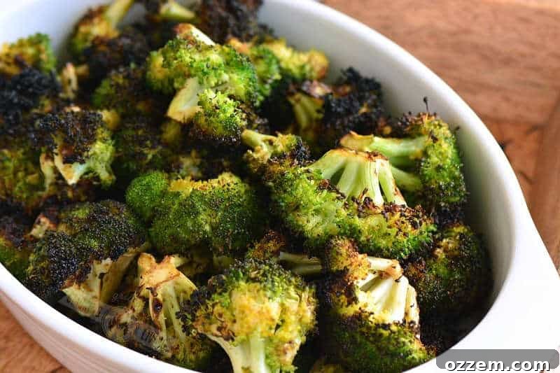 cooked broccoli in a white dish horizontal