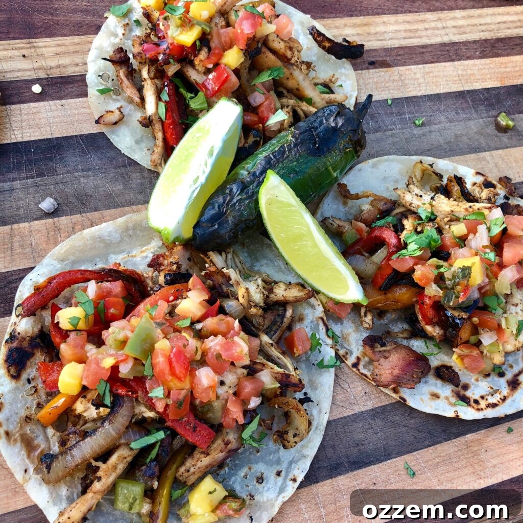 Sizzling chicken fajitas with taco seasoning and fresh toppings