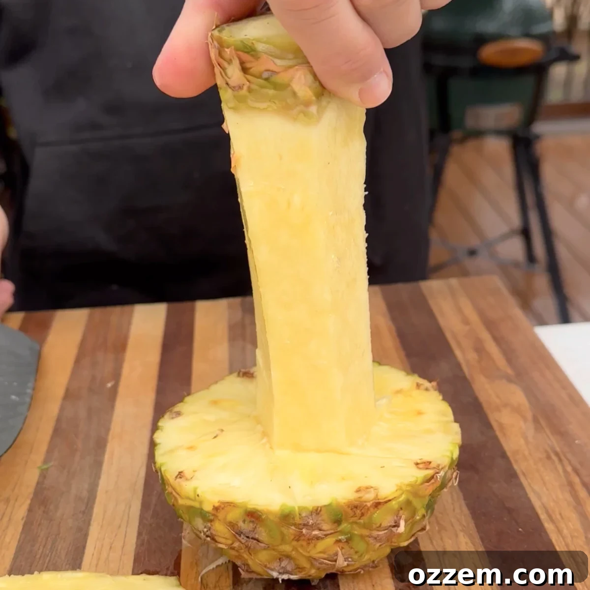 Pineapple core on a cutting board.