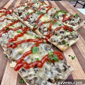 Polish Zapiekanka served on a cutting board