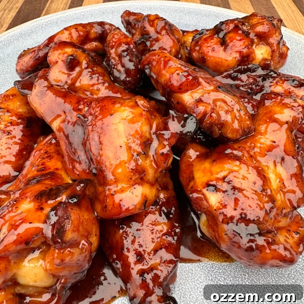 Deliciously glazed Honey BBQ Chicken Wings ready to be served from the grill.