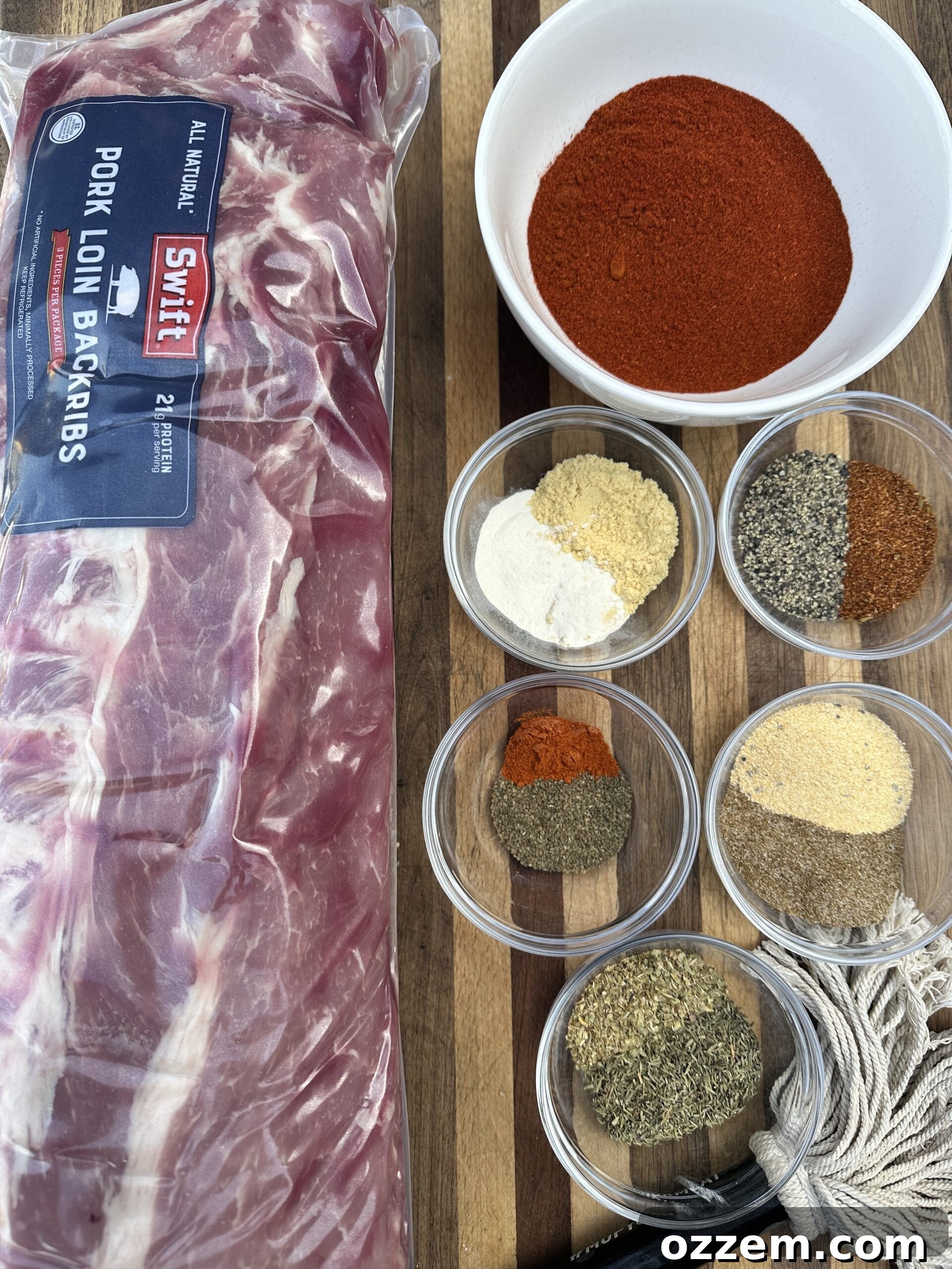 A selection of spices laid out, ready to be mixed for Memphis style rib dry rub.