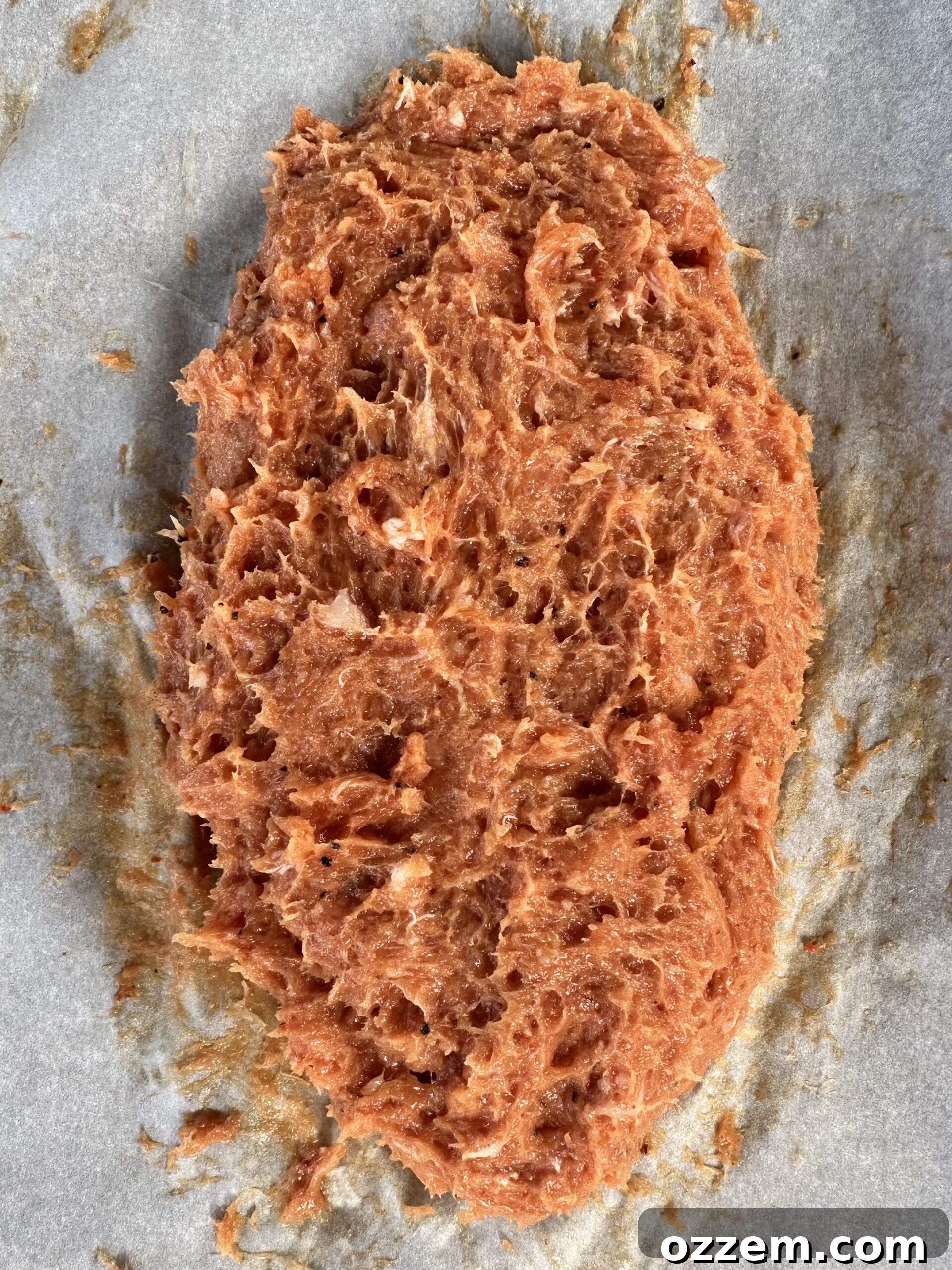 Finely processed pork paste ready for shaping McRib patties