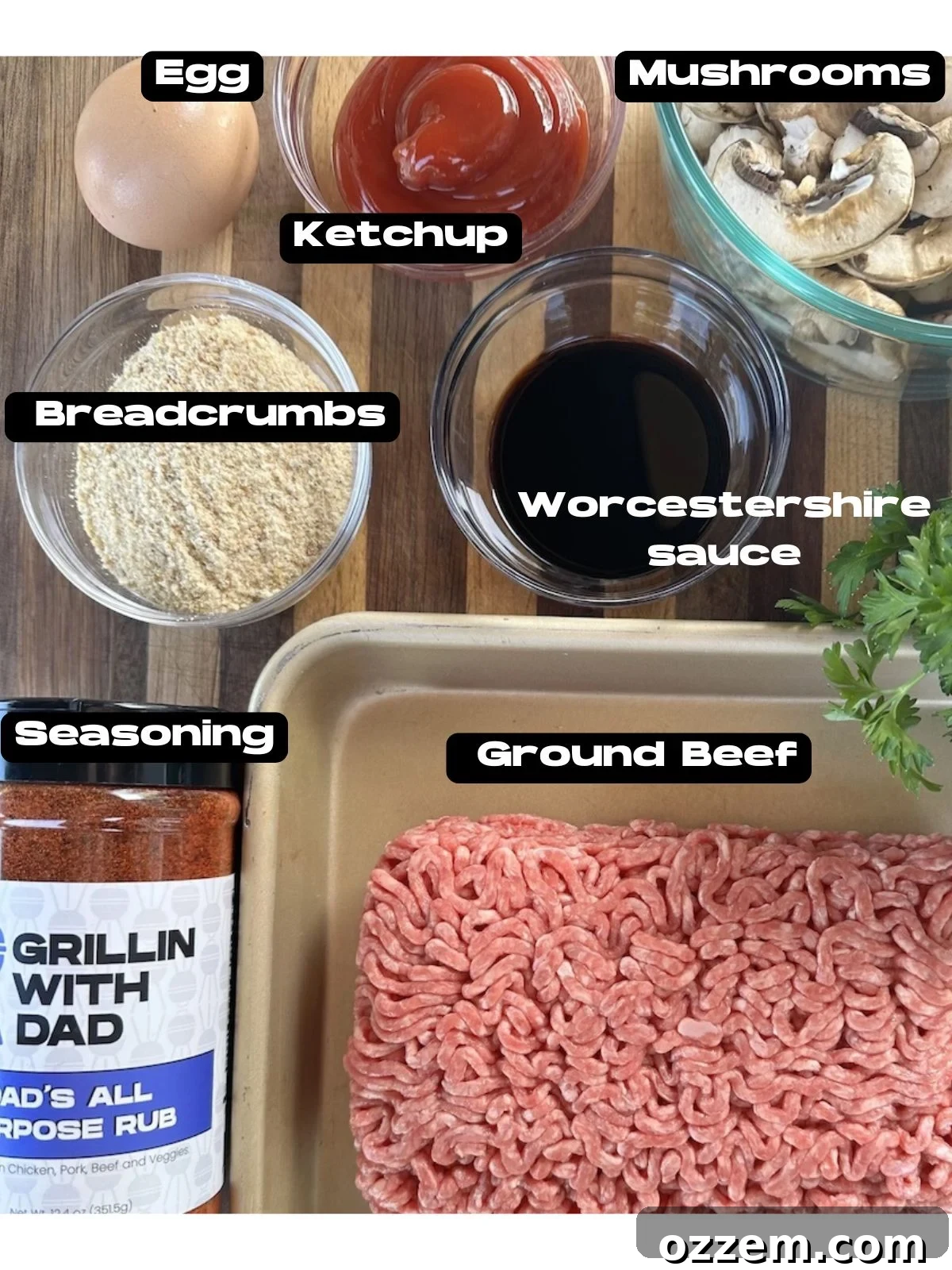 All ingredients laid out for making homemade Salisbury steak including ground beef, mushrooms, onions, and seasonings.