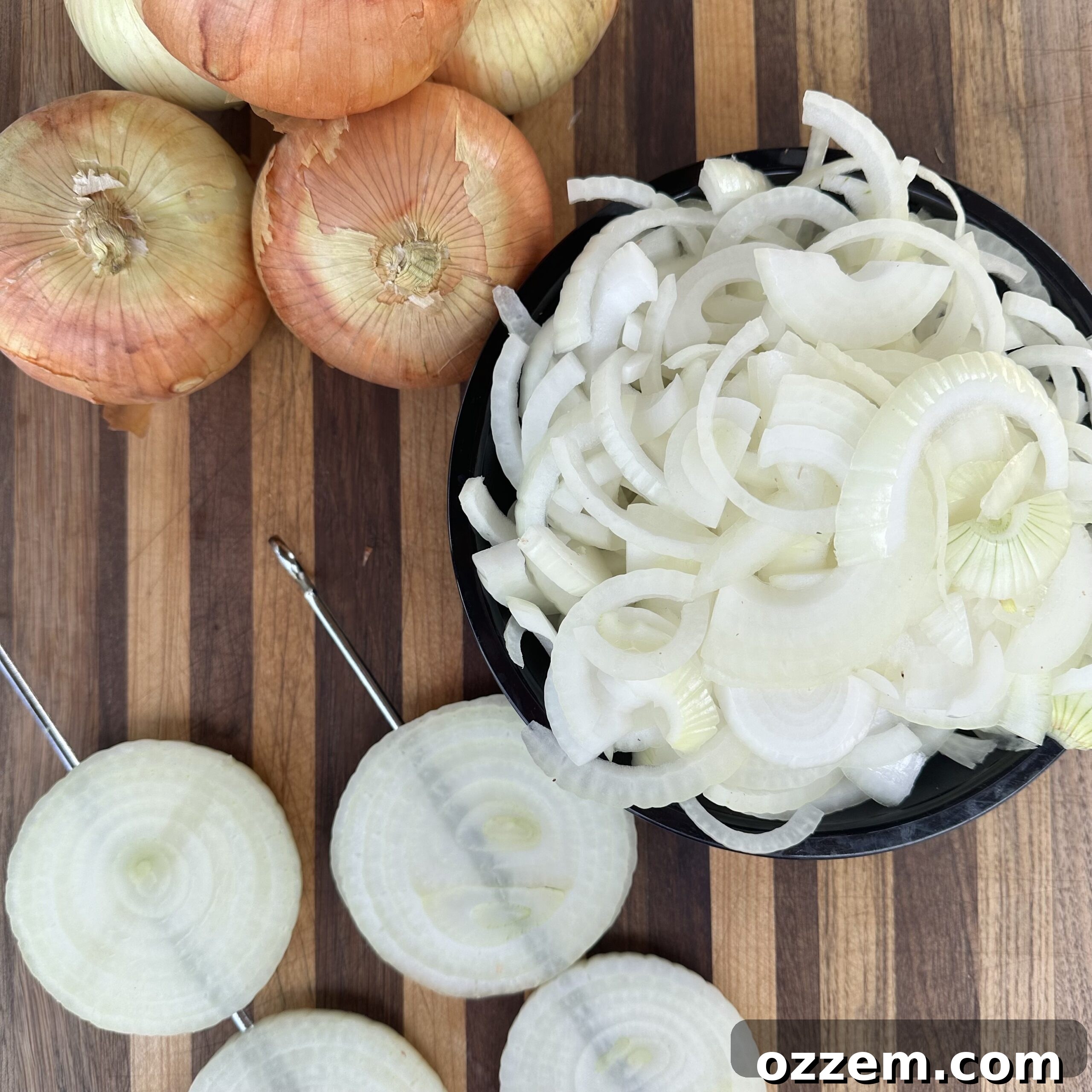 Sliced Vidalia Onions and Bacon in a Skillet