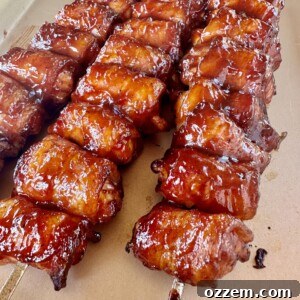 Bacon Wrapped Chicken Skewers with BBQ glaze.