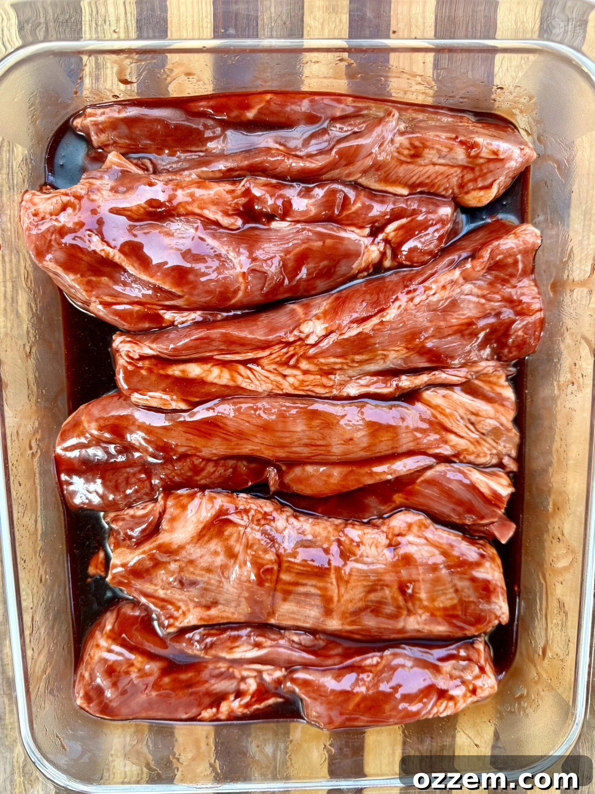 Sticky Sweet Char Siu 4 Pork strips thoroughly coated in Chinese BBQ Char Siu marinade.