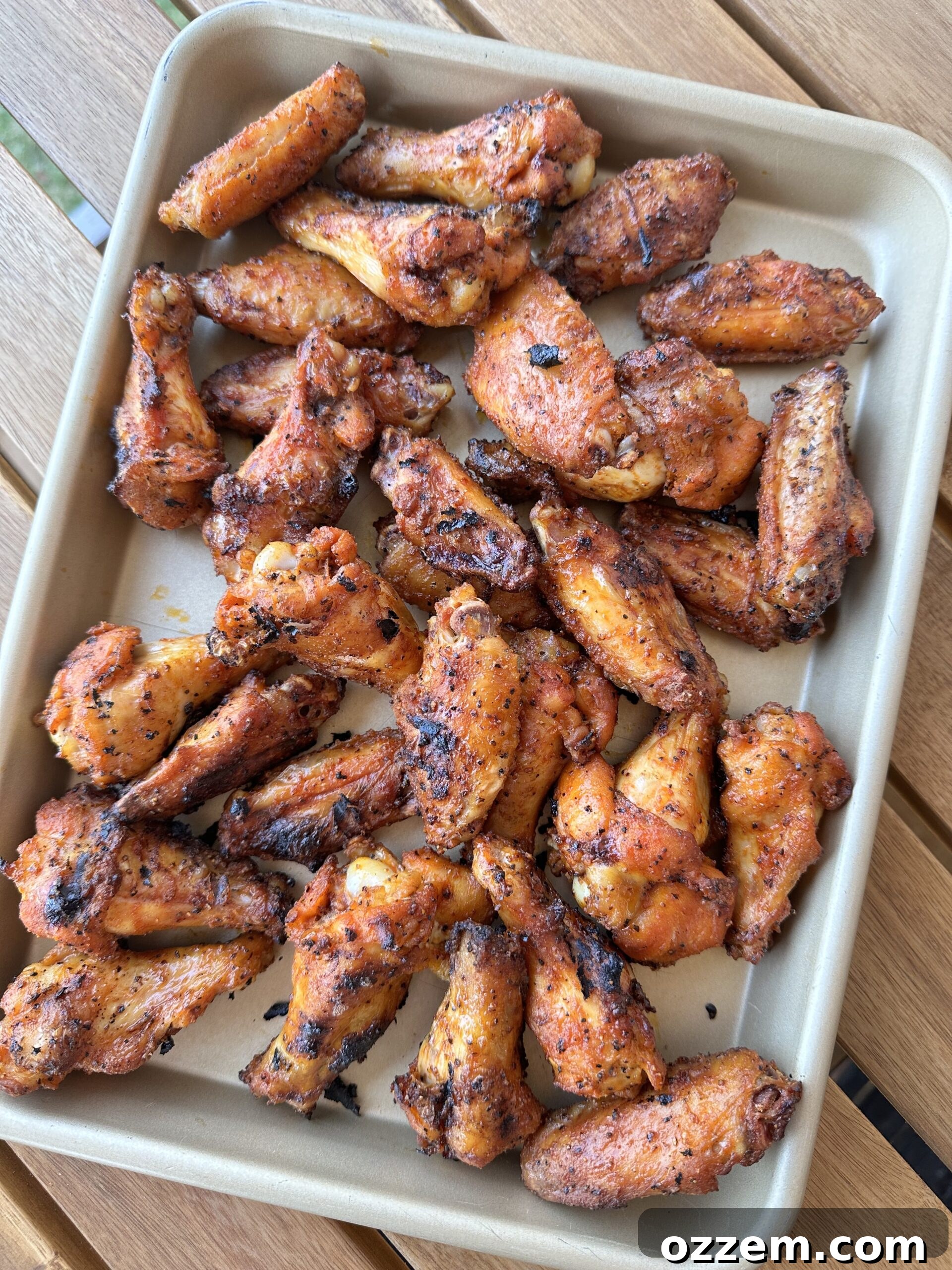 Perfectly grilled wings with crispy skin.