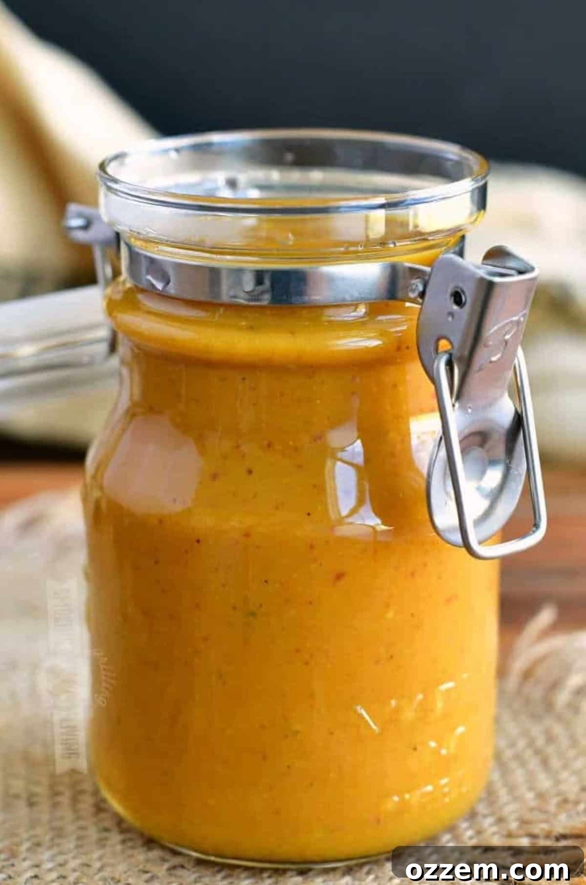 Carolina mustard BBQ sauce in a glass jar.