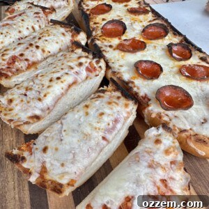 Homemade pizza bread with a crispy crust and melted cheese, ready to serve.