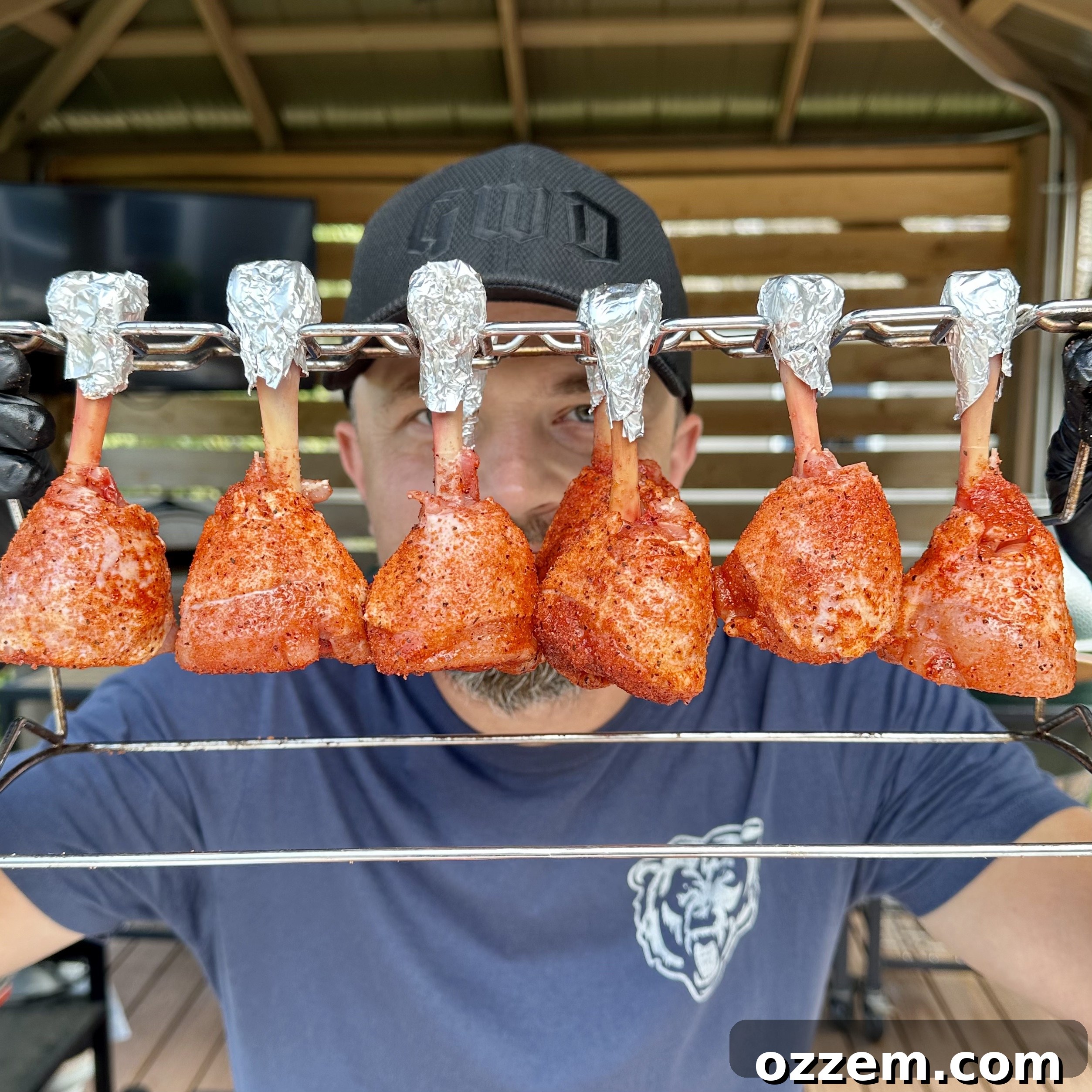 Bourbon Peach Chicken Lollipops 4 Nicely seasoned chicken lollipops ready for the grill, showcasing a rich rub.