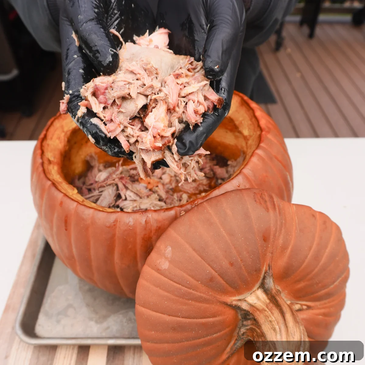 Finished pulled pork inside a pumpkin, ready to be served