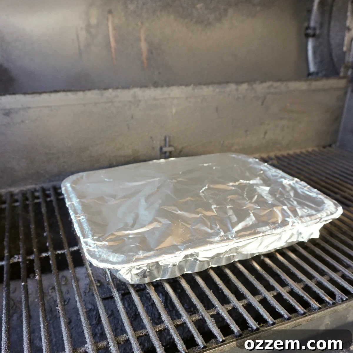 Velvet Smoke Ribs 11 A foil pan tightly wrapped with aluminum foil, placed back on the smoker to braise the short ribs.
