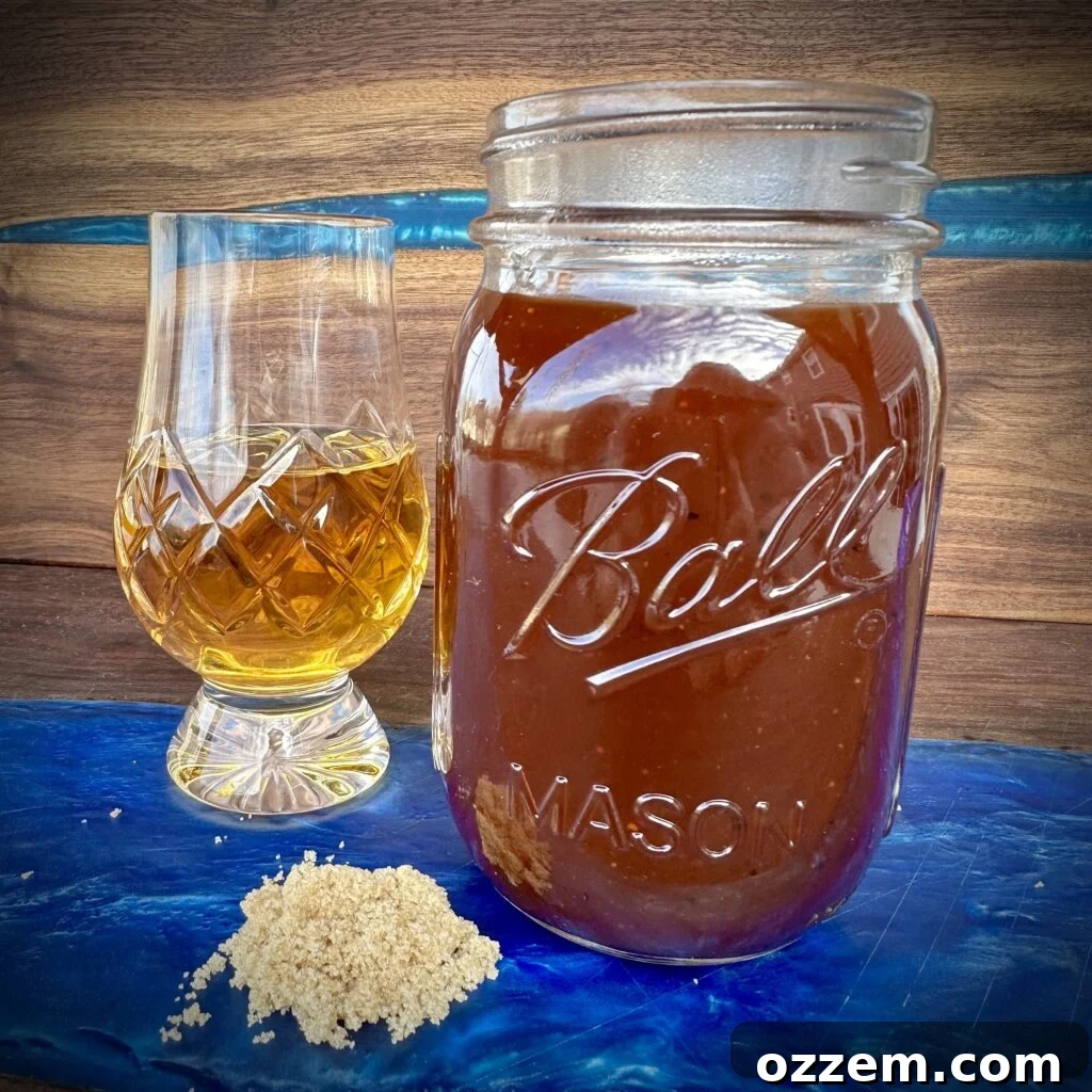 Delicious homemade Bourbon BBQ Sauce in a jar, ready for grilling.