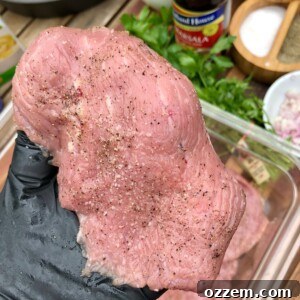 Grilled Veal Medallions in Marsala Sauce 3 Perfectly seasoned veal cutlets, lightly coated with salt and pepper, waiting to be grilled to perfection.