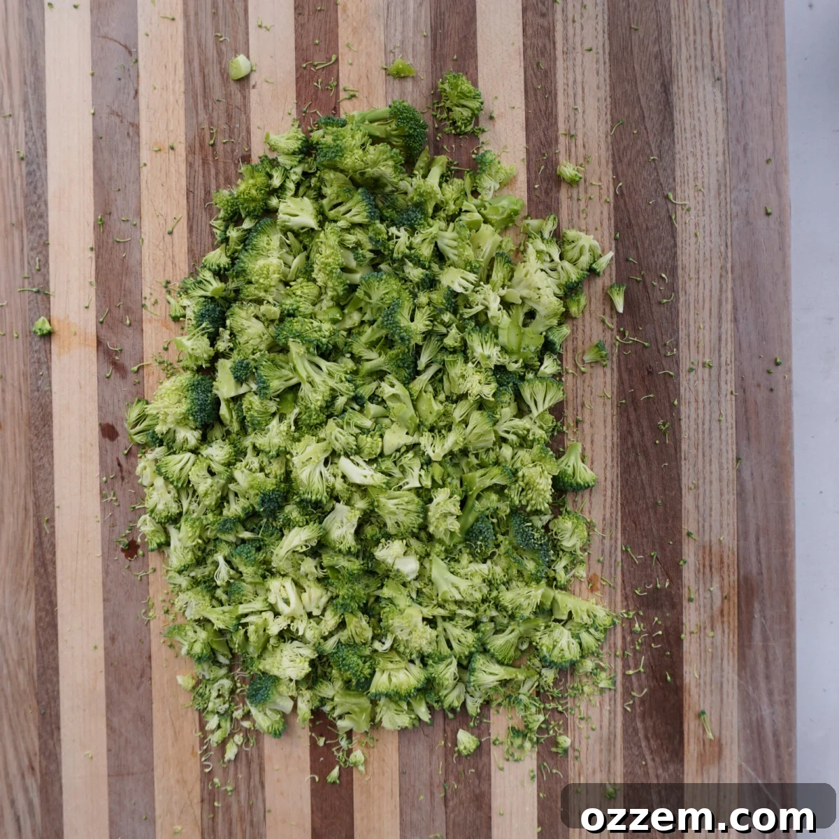 chopped raw broccoli on cutting board