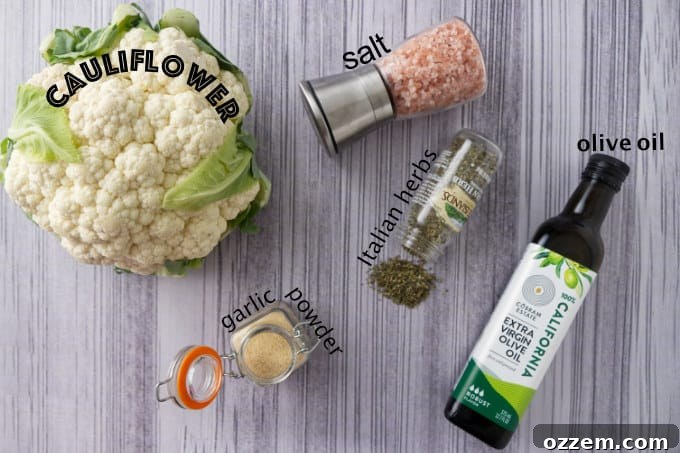 Ingredients used for air fryer cauliflower: a head of cauliflower, olive oil, garlic powder, Italian seasoning, and salt.