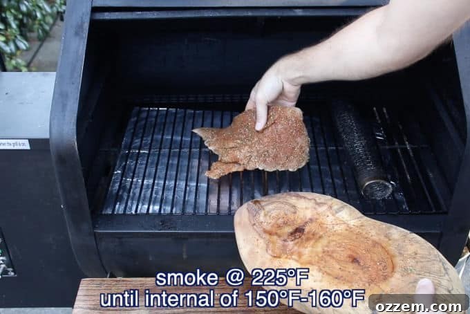 Hunter's Smoked Wild Turkey Breast 9 A wild turkey breast carefully being placed onto the hot grates of a smoker, ready to absorb the flavorful smoke at a low and slow temperature.