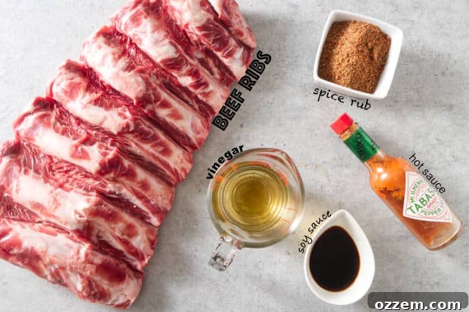 A curated selection of ingredients laid out, ready for preparing delicious Traeger smoked beef ribs.