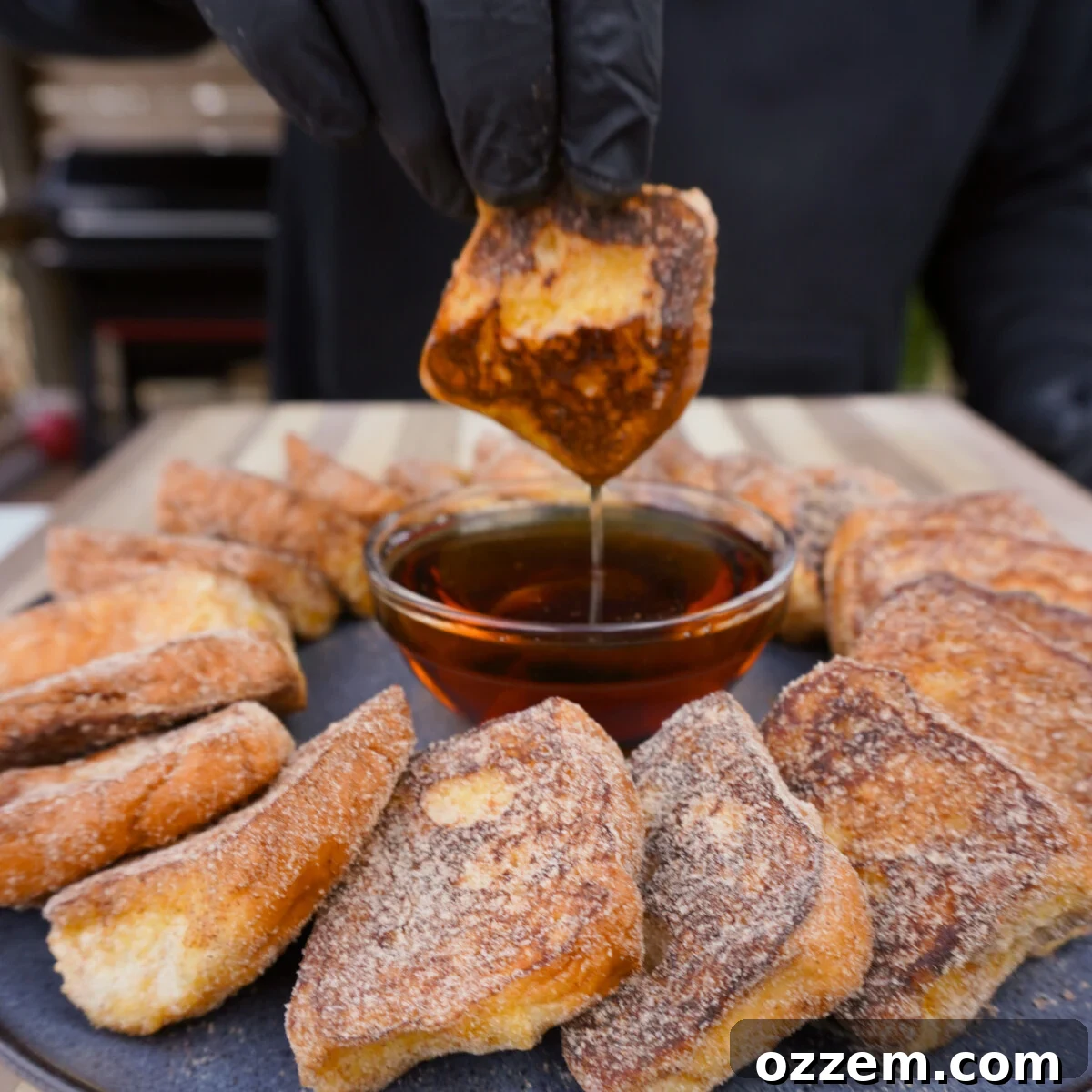 Easy Grilled French Toast dipped in Maple syrup.