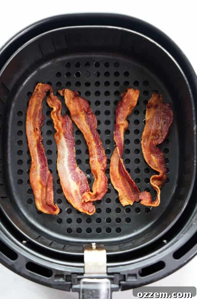 Ultimate Air Fryer Bacon 2 4 strips of bacon in an air fryer