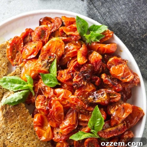 A plate of air fryer cherry tomatoes with toast.