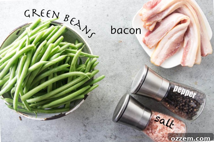 The simple, fresh ingredients laid out before making air fryer green beans and bacon: green beans, bacon, salt, and pepper.