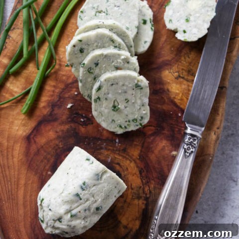 A log of blue cheese butter sliced into rounds for steak.