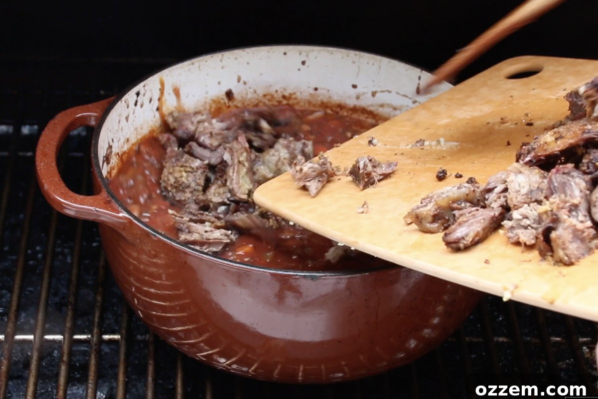 Adding chopped short rib to ragu sauce