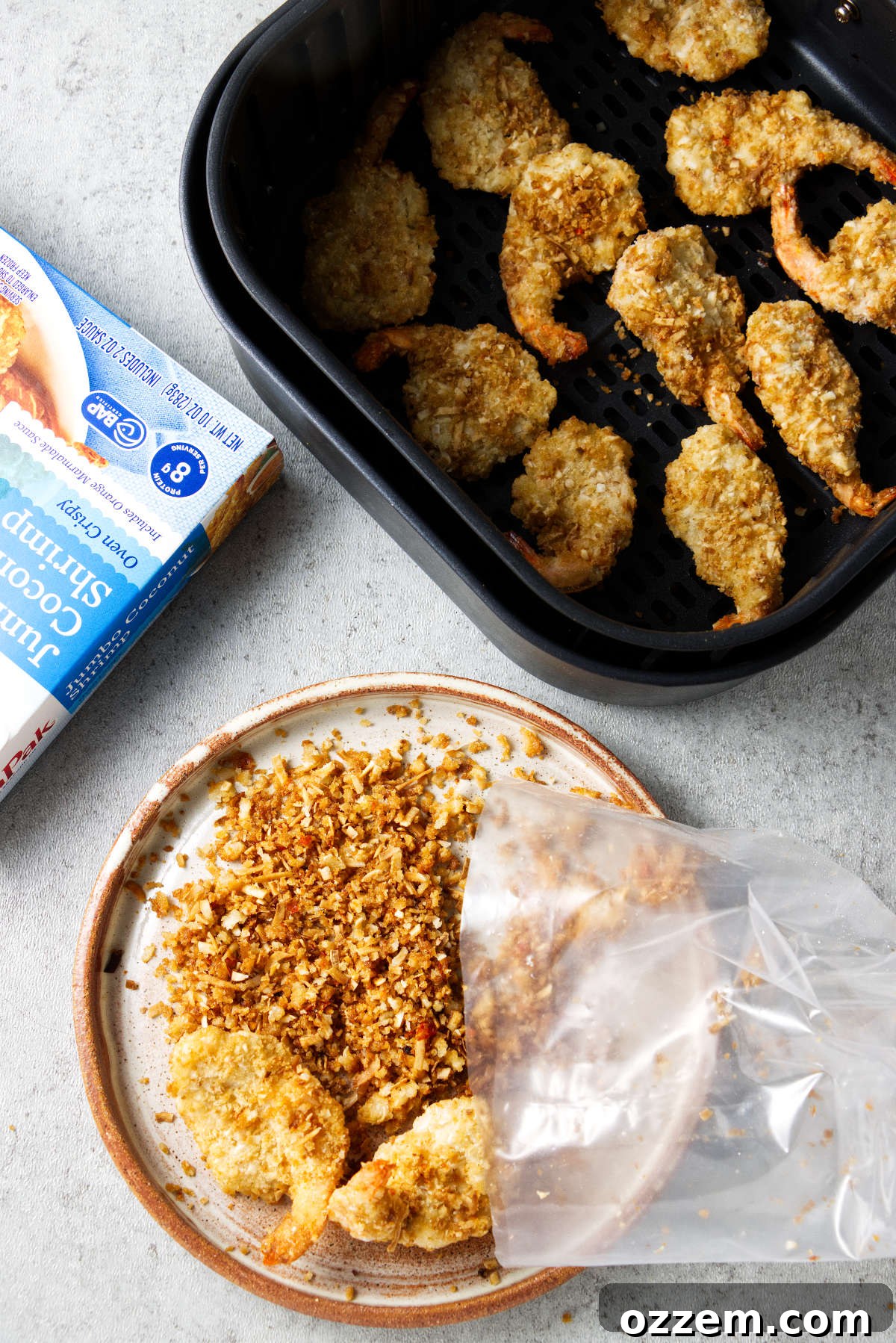 Crispy Air Fryer Frozen Coconut Shrimp 4 Sorting the crumbs out of frozen coconut shrimp.