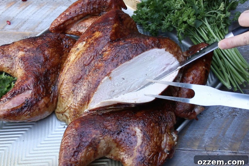 carving the smoked spatchcock turkey