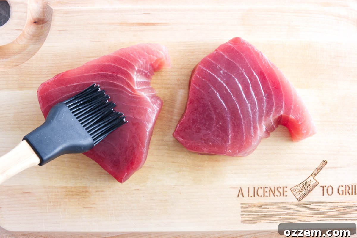 Succulent Air Fryer Tuna Steaks 4 brushing tuna steaks with oil