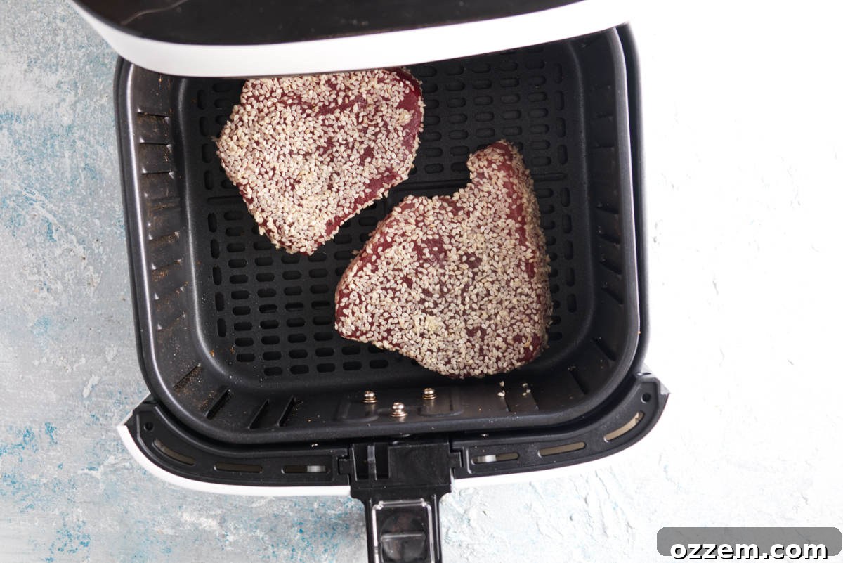Succulent Air Fryer Tuna Steaks 7 cooking tuna steaks in the air fryer basket