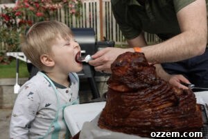 Taking a bite of double smoked ham.