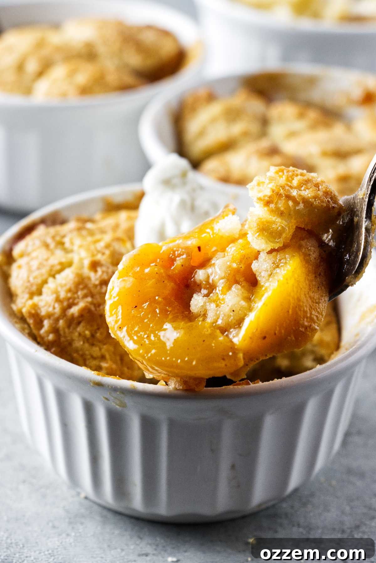 close up of air fryer peach cobbler