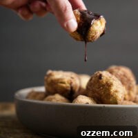 chocolate sauce dripping form donut hole