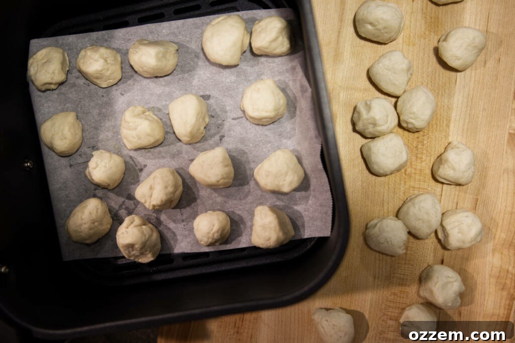 Golden Air Fryer Doughnut Bites 7 donut holes in air fryer basket