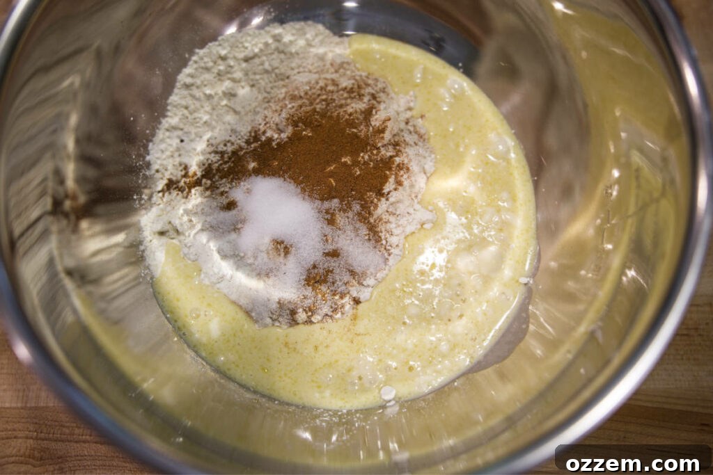 Golden Air Fryer Doughnut Bites 9 mixing wet and dry ingredients for donut holes