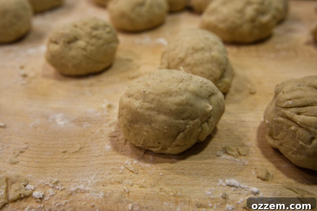 Golden Air Fryer Doughnut Bites 10 air fryer donut holes rolled out on cutting board