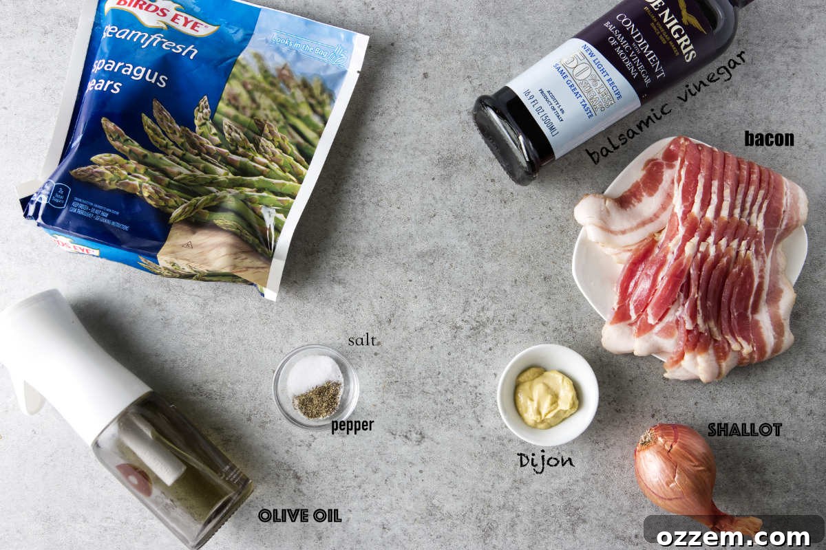 Crispy Air Fryer Frozen Asparagus 4 Ingredients for frozen asparagus in air fryer. Balsamic vinegar, bacon, shallot, fijon, salt, pepper, olive oil, and asparagus.