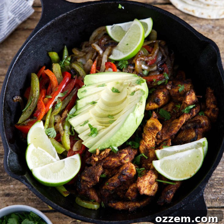 Blackstone Fajitas recipe card image with chicken and avocado.